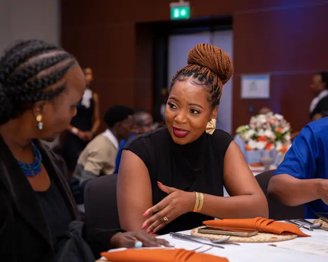 Guests in discussion at their table